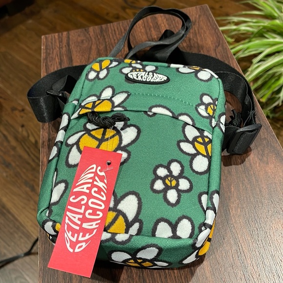 petals and peacocks Handbags - NWT Petals and Peacocks Peace Sign Flower Green Canvas Crossbody Bag